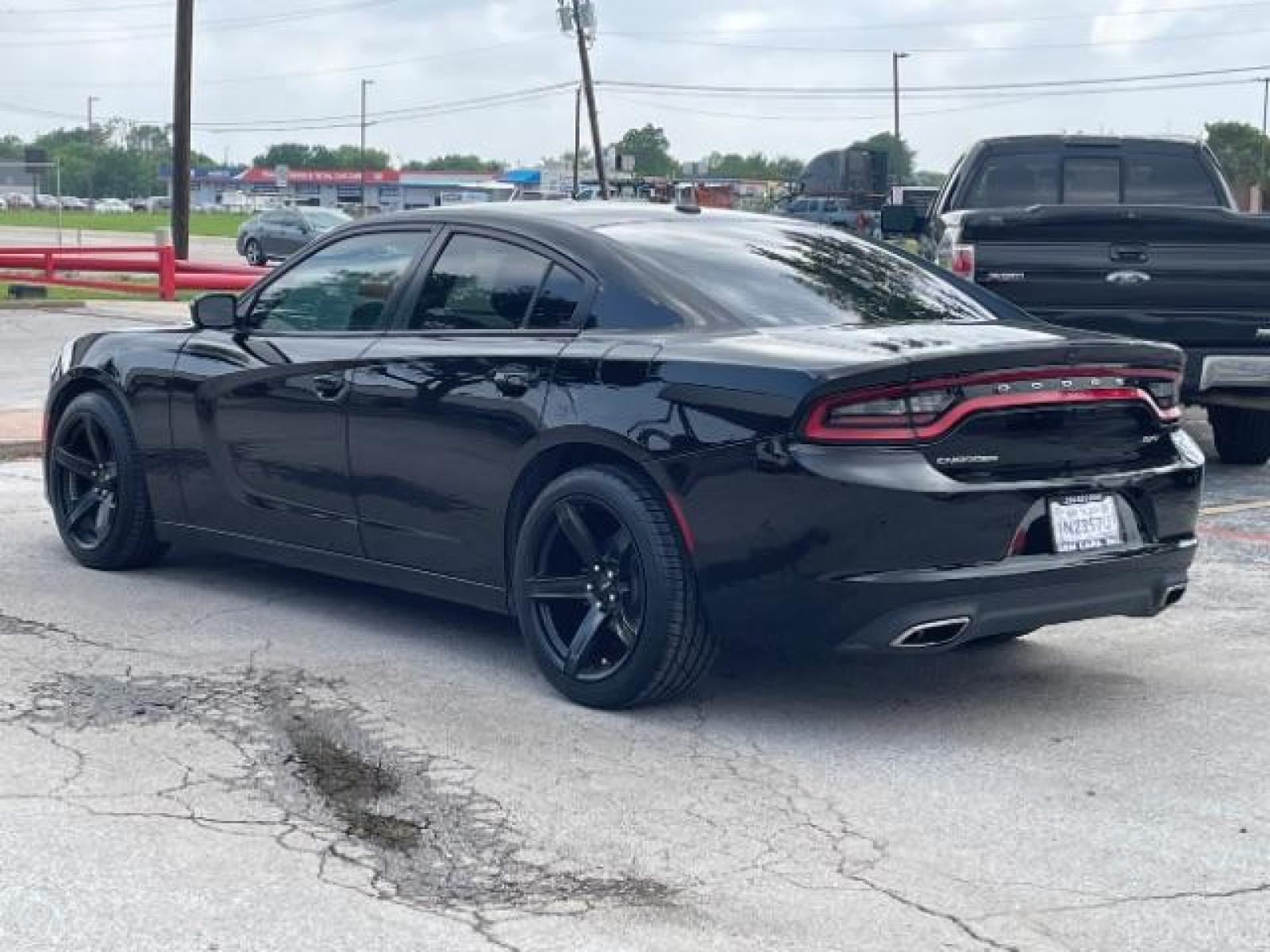 2020 Pitch Black Clear Co Dodge Charger SXT (2C3CDXBG3LH) with an 3.6L V6 DOHC 24V engine, 8-Speed Automatic transmission, located at 12182 Garland Rd, Dallas, TX, 75218, (214) 521-2040, 0.000000, 0.000000 - Photo #2