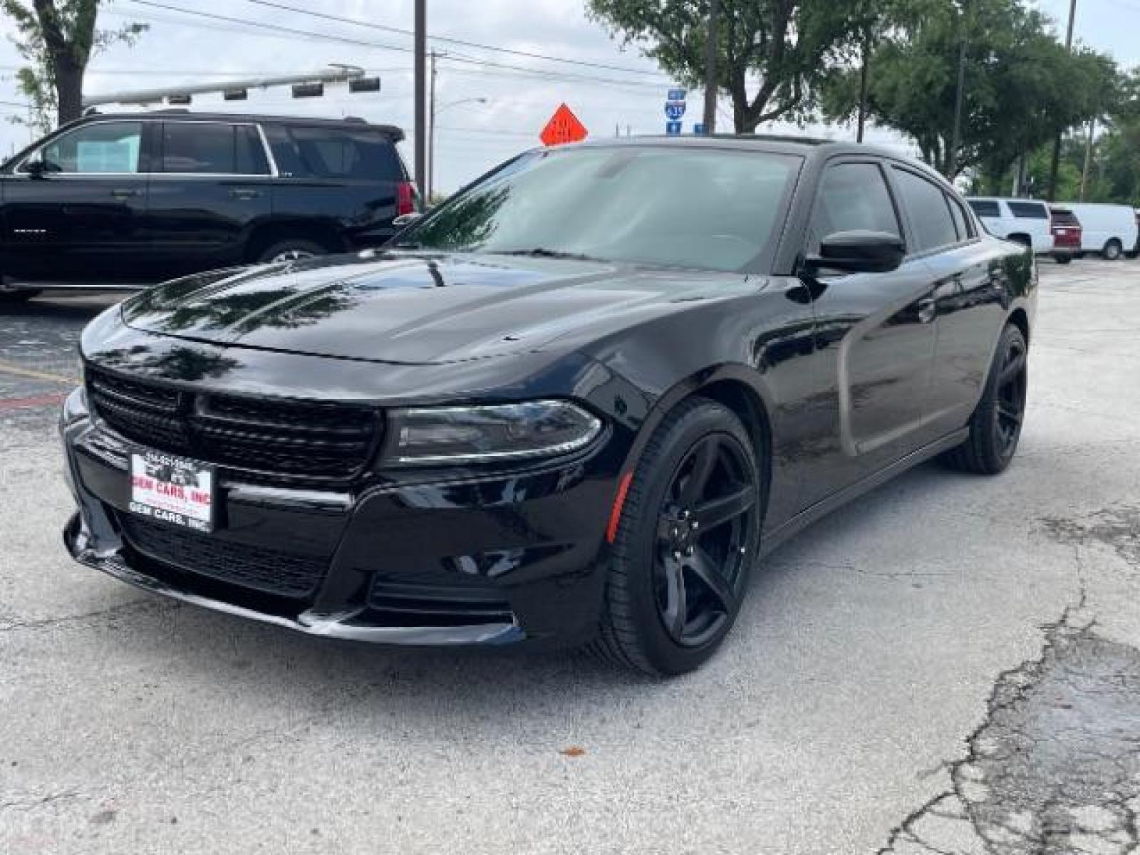 2020 Pitch Black Clear Co Dodge Charger SXT (2C3CDXBG3LH) with an 3.6L V6 DOHC 24V engine, 8-Speed Automatic transmission, located at 12182 Garland Rd, Dallas, TX, 75218, (214) 521-2040, 0.000000, 0.000000 - Photo #4