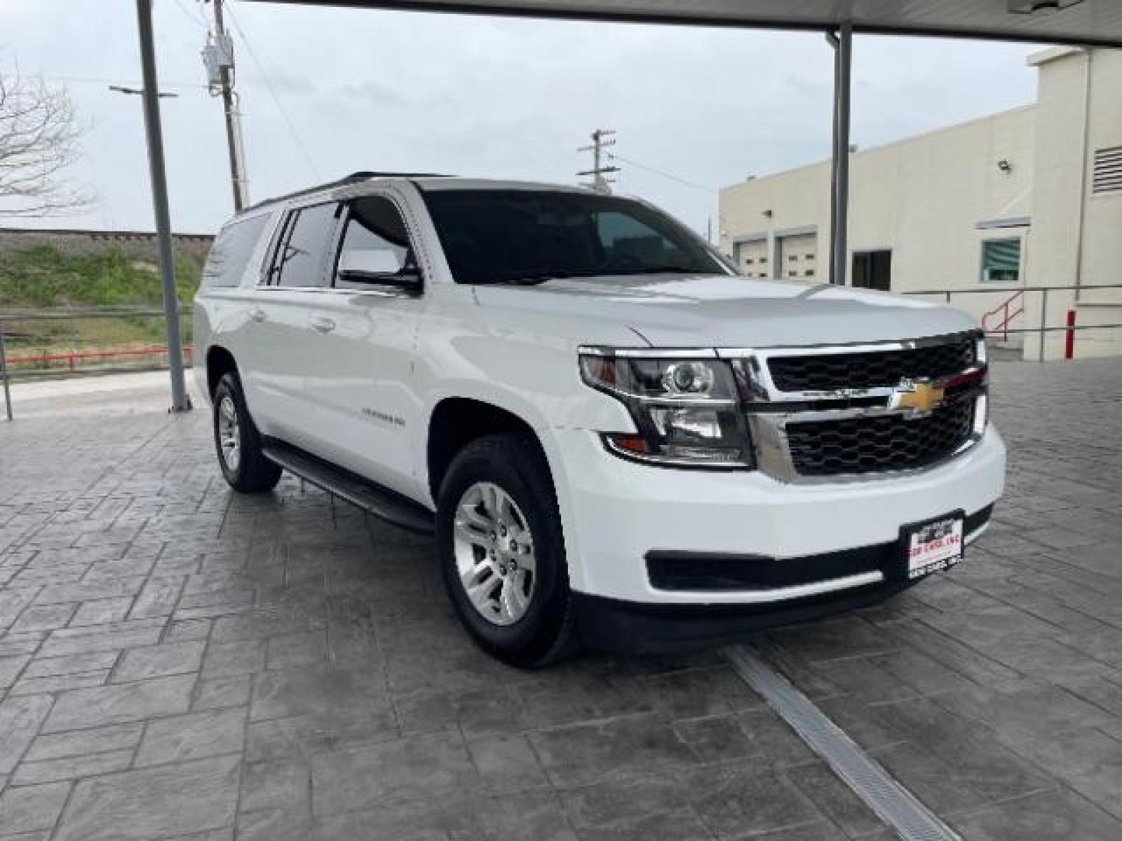 2018 Summit White Chevrolet Suburban LS 2WD (1GNSCGKC6JR) with an 5.3L V8 OHV 16V engine, 6-Speed Automatic transmission, located at 12182 Garland Rd, Dallas, TX, 75218, (214) 521-2040, 0.000000, 0.000000 - Photo #0