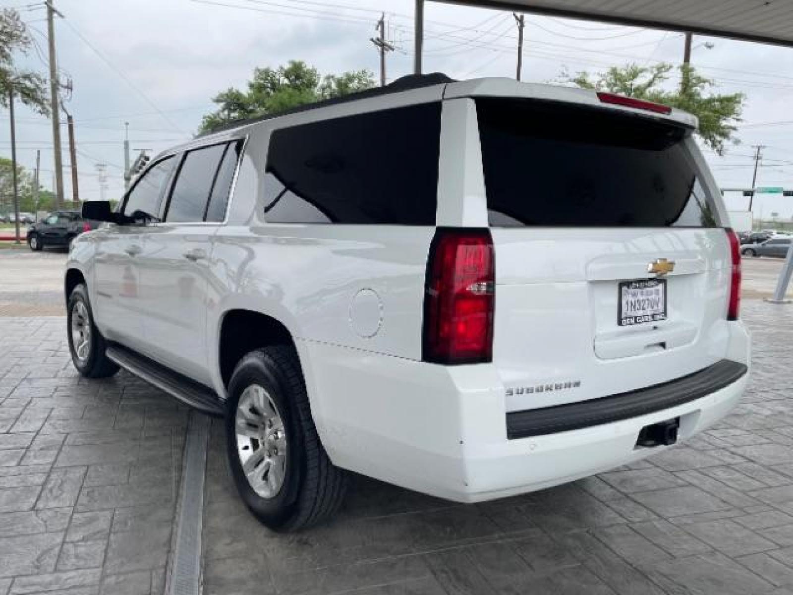 2018 Summit White Chevrolet Suburban LS 2WD (1GNSCGKC6JR) with an 5.3L V8 OHV 16V engine, 6-Speed Automatic transmission, located at 12182 Garland Rd, Dallas, TX, 75218, (214) 521-2040, 0.000000, 0.000000 - Photo #6