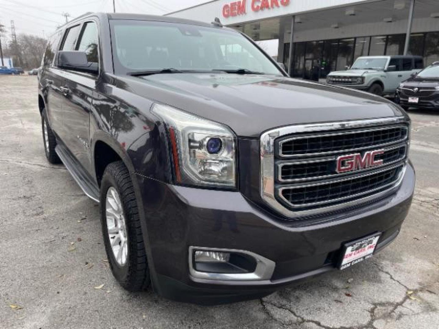 2015 Midnight Amethyst Met /Jet Black GMC Yukon XL SLT 1/2 Ton 4WD (1GKS2HKC2FR) with an 5.3L V8 OHV 16V engine, 6-Speed Automatic transmission, located at 12182 Garland Rd, Dallas, TX, 75218, (214) 521-2040, 0.000000, 0.000000 - Photo#0