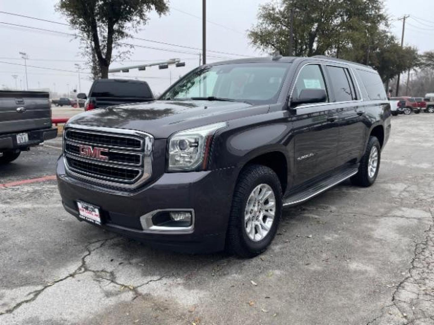 2015 Midnight Amethyst Met /Jet Black GMC Yukon XL SLT 1/2 Ton 4WD (1GKS2HKC2FR) with an 5.3L V8 OHV 16V engine, 6-Speed Automatic transmission, located at 12182 Garland Rd, Dallas, TX, 75218, (214) 521-2040, 0.000000, 0.000000 - Photo#1