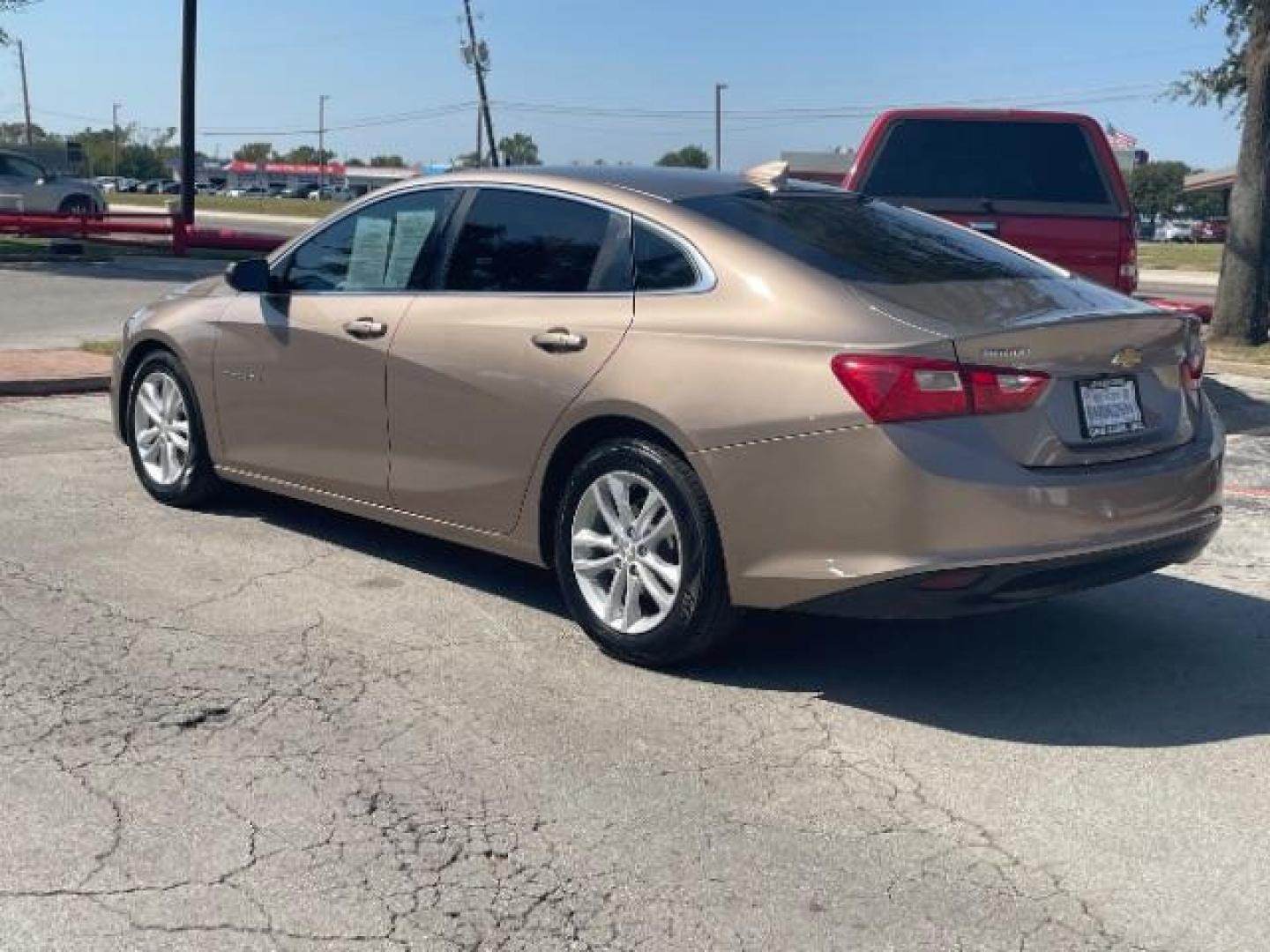 2018 Brown Chevrolet Malibu LT (1G1ZD5ST8JF) with an 1.5L L4 DOHC 16V engine, 6-Speed Automatic transmission, located at 12182 Garland Rd, Dallas, TX, 75218, (214) 521-2040, 0.000000, 0.000000 - Photo#2