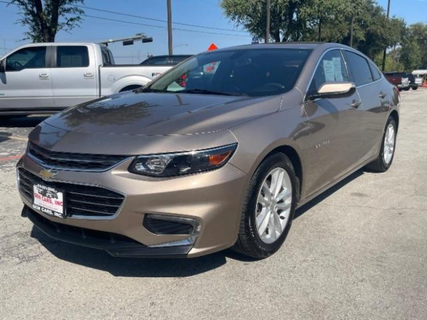 2018 Brown Chevrolet Malibu LT (1G1ZD5ST8JF) with an 1.5L L4 DOHC 16V engine, 6-Speed Automatic transmission, located at 12182 Garland Rd, Dallas, TX, 75218, (214) 521-2040, 0.000000, 0.000000 - Photo#4