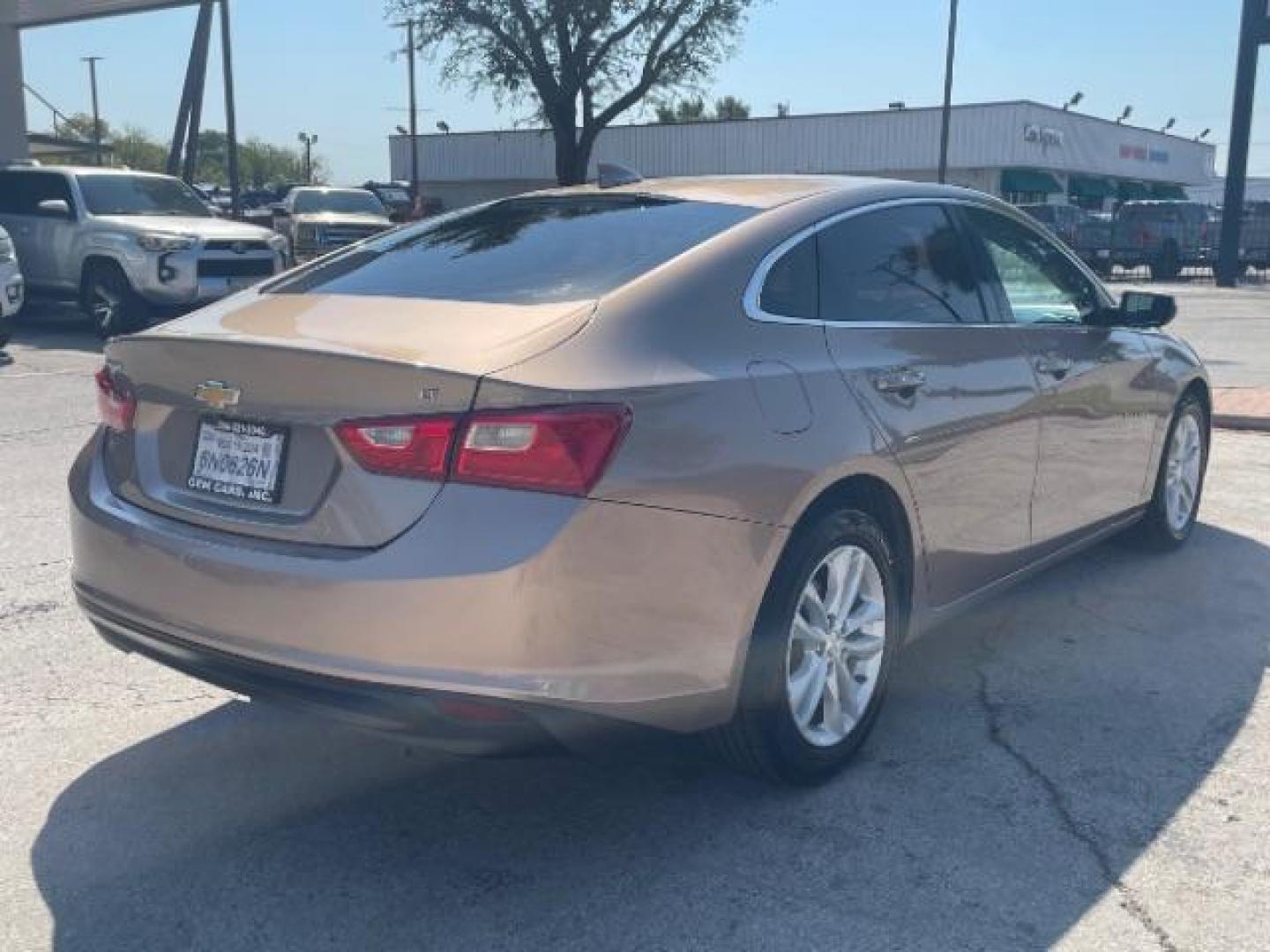 2018 Brown Chevrolet Malibu LT (1G1ZD5ST8JF) with an 1.5L L4 DOHC 16V engine, 6-Speed Automatic transmission, located at 12182 Garland Rd, Dallas, TX, 75218, (214) 521-2040, 0.000000, 0.000000 - Photo#5