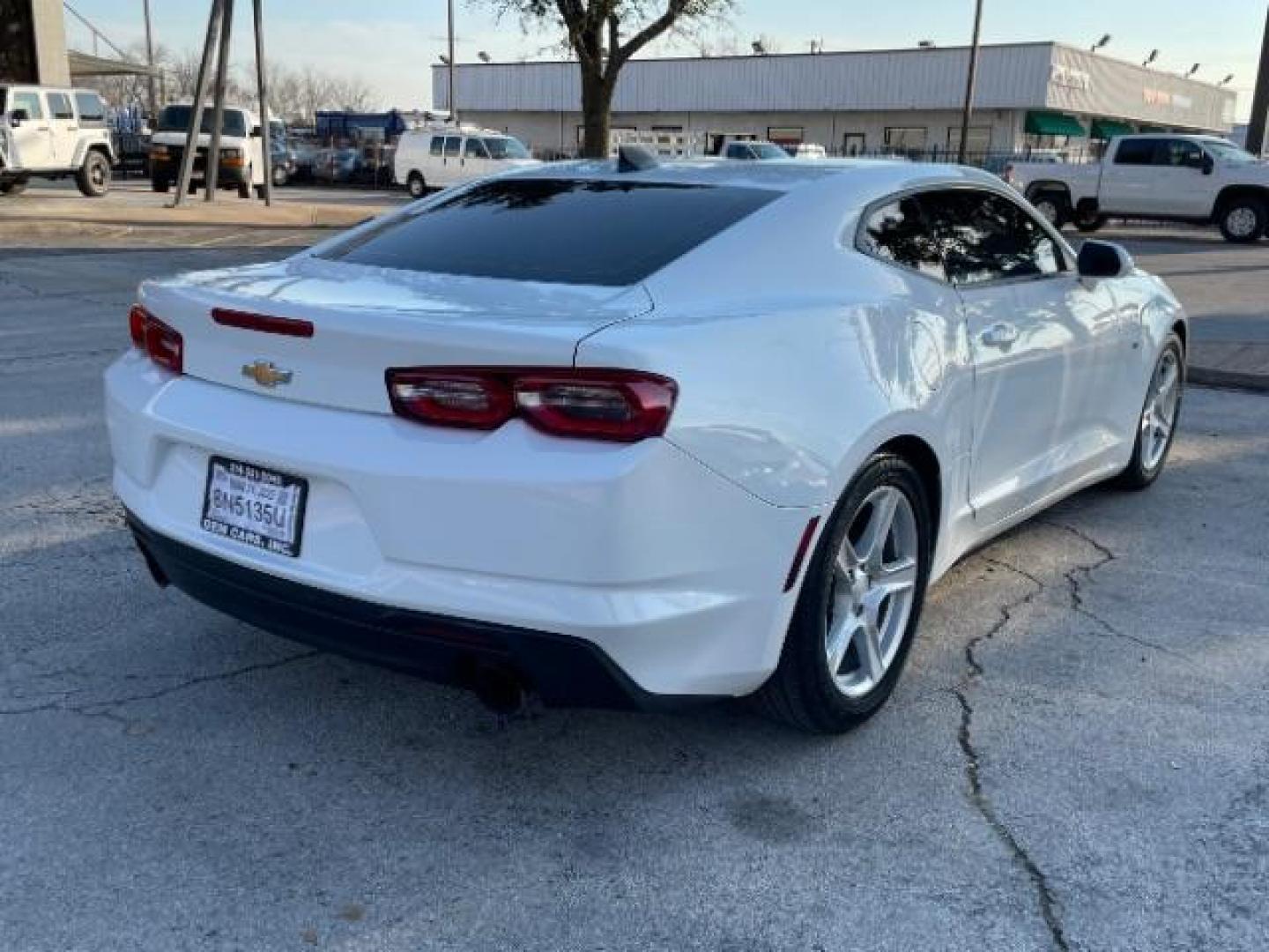 2019 Summit White Chevrolet Camaro 1LT Coupe (1G1FB1RX6K0) with an 2.0L L4 DOHC 16V TUR engine, 6-Speed Manual transmission, located at 12182 Garland Rd, Dallas, TX, 75218, (214) 521-2040, 0.000000, 0.000000 - Photo#4