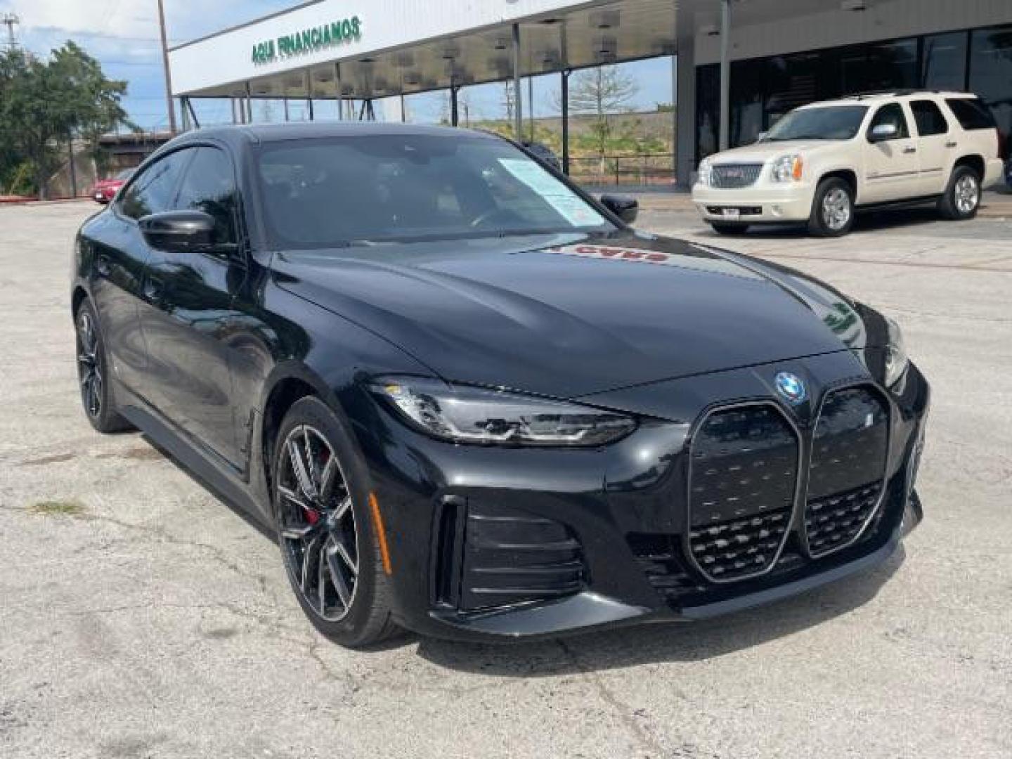 2023 Black Sapphire Metal BMW i4 eDrive40 (WBY73AW06PF) with an ELECTRIC engine, Continuously Variabl transmission, located at 12182 Garland Rd, Dallas, TX, 75218, (214) 521-2040, 0.000000, 0.000000 - Photo#0