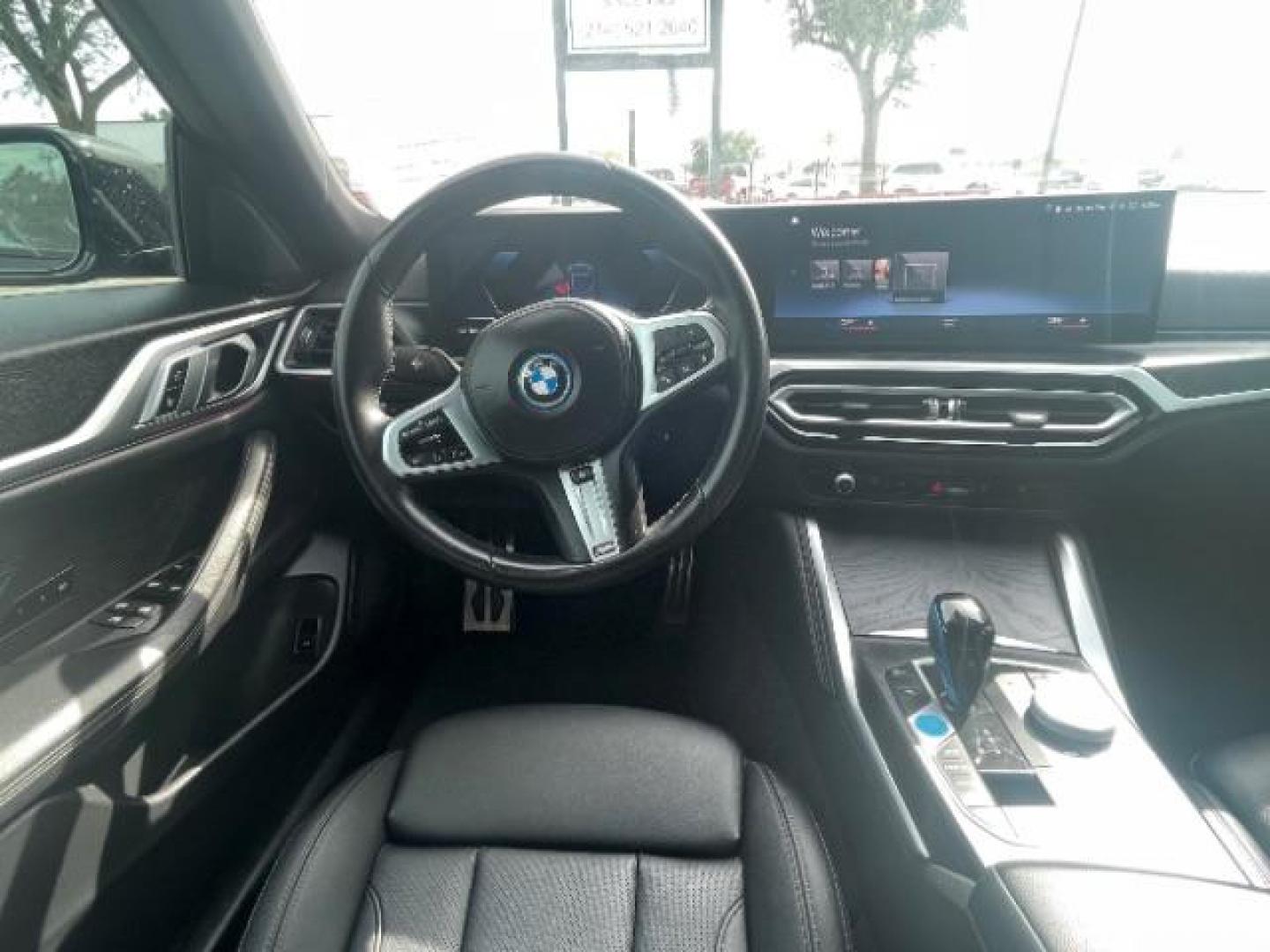 2023 Black Sapphire Metal BMW i4 eDrive40 (WBY73AW06PF) with an ELECTRIC engine, Continuously Variabl transmission, located at 12182 Garland Rd, Dallas, TX, 75218, (214) 521-2040, 0.000000, 0.000000 - Photo#11