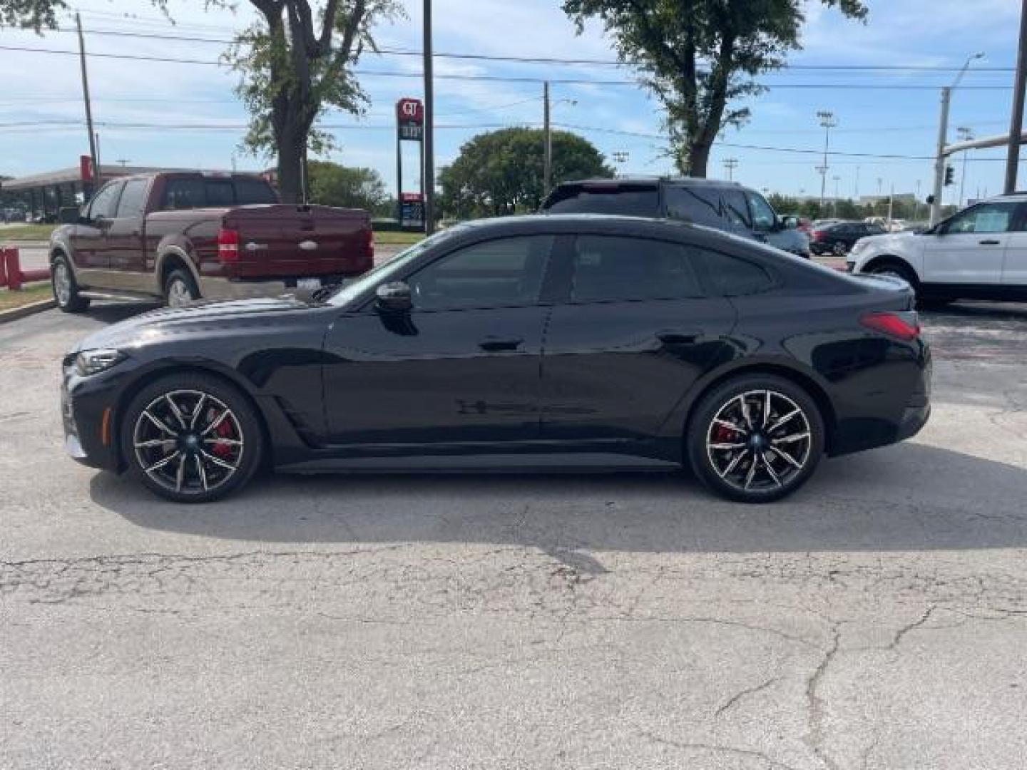 2023 Black Sapphire Metal BMW i4 eDrive40 (WBY73AW06PF) with an ELECTRIC engine, Continuously Variabl transmission, located at 12182 Garland Rd, Dallas, TX, 75218, (214) 521-2040, 0.000000, 0.000000 - Photo#1