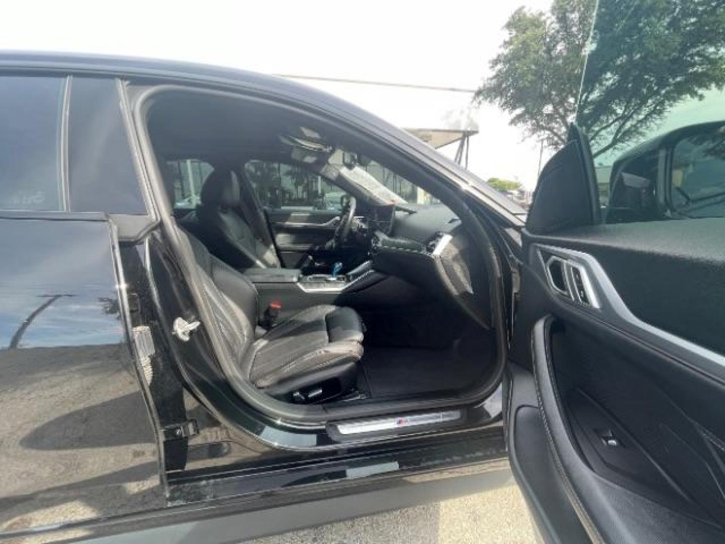 2023 Black Sapphire Metal BMW i4 eDrive40 (WBY73AW06PF) with an ELECTRIC engine, Continuously Variabl transmission, located at 12182 Garland Rd, Dallas, TX, 75218, (214) 521-2040, 0.000000, 0.000000 - Photo#8