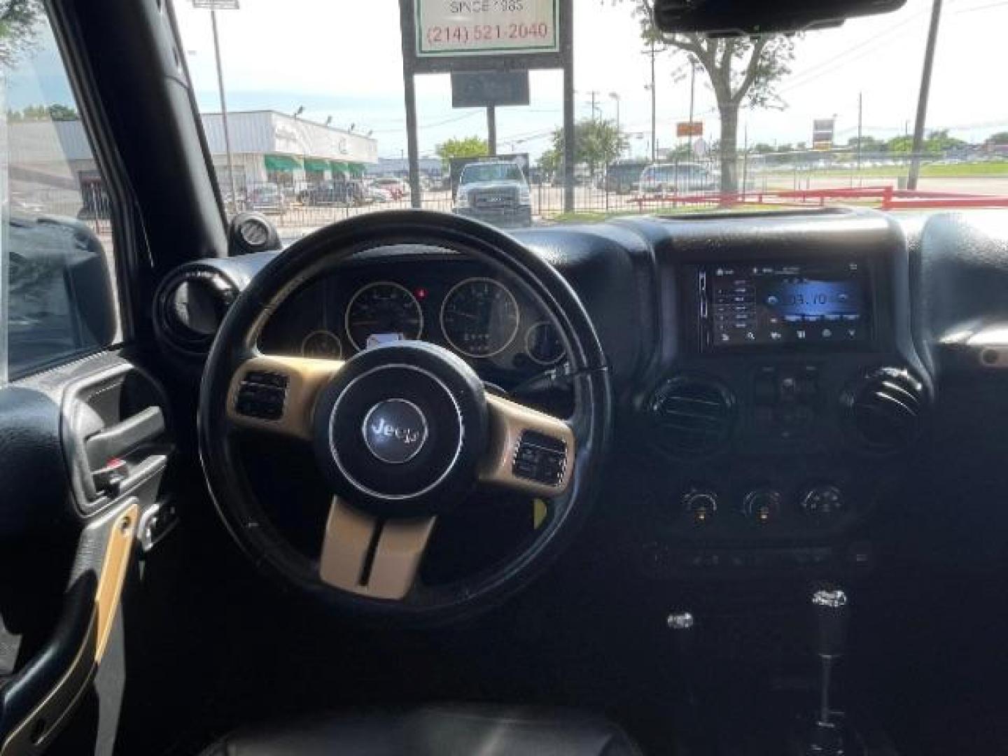 2014 Black Clearcoat Jeep Wrangler Unlimited Sahara 4WD (1C4BJWEG9EL) with an 3.6L V6 DOHC 24V FFV engine, located at 12182 Garland Rd, Dallas, TX, 75218, (214) 521-2040, 0.000000, 0.000000 - Photo#12