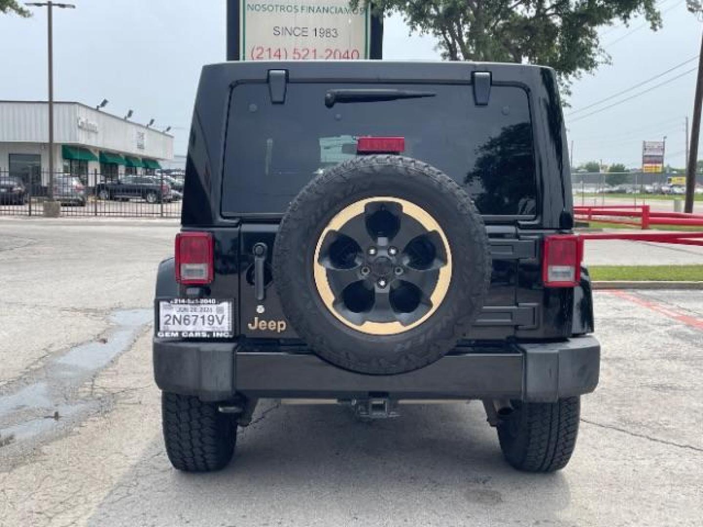 2014 Black Clearcoat Jeep Wrangler Unlimited Sahara 4WD (1C4BJWEG9EL) with an 3.6L V6 DOHC 24V FFV engine, located at 12182 Garland Rd, Dallas, TX, 75218, (214) 521-2040, 0.000000, 0.000000 - Photo#4