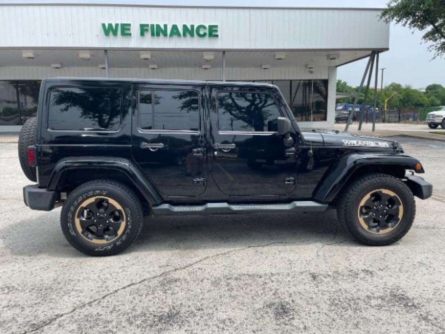 2014 Black Clearcoat Jeep Wrangler Unlimited Sahara 4WD (1C4BJWEG9EL) with an 3.6L V6 DOHC 24V FFV engine, located at 12182 Garland Rd, Dallas, TX, 75218, (214) 521-2040, 0.000000, 0.000000 - Photo#6