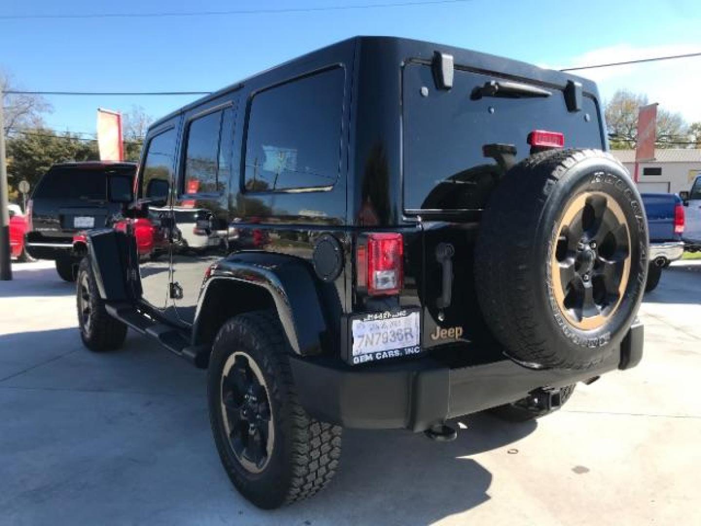 2014 Black Clearcoat /Black Jeep Wrangler Unlimited Sahara 4WD (1C4BJWEG9EL) with an 3.6L V6 DOHC 24V FFV engine, 5-Speed Automatic transmission, located at 12182 Garland Rd, Dallas, TX, 75218, (214) 521-2040, 0.000000, 0.000000 - Photo#6