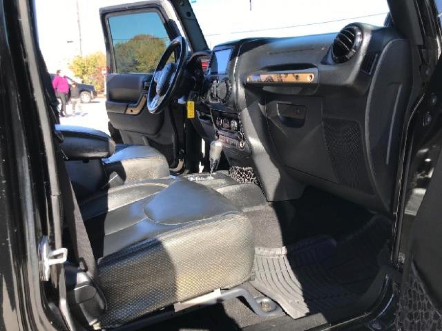 2014 Black Clearcoat /Black Jeep Wrangler Unlimited Sahara 4WD (1C4BJWEG9EL) with an 3.6L V6 DOHC 24V FFV engine, 5-Speed Automatic transmission, located at 12182 Garland Rd, Dallas, TX, 75218, (214) 521-2040, 0.000000, 0.000000 - Photo#15