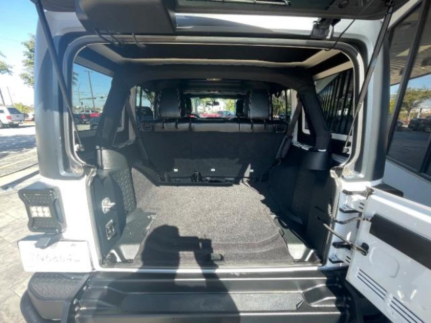 2018 Bright White Clear Coat /Black Leather Trim with Embossed inserts Jeep Wrangler JK Unlimited Sport 4WD (1C4BJWDG0JL) with an 3.6L V6 DOHC 24V FFV engine, 6-Speed Automatic transmission, located at 12182 Garland Rd, Dallas, TX, 75218, (214) 521-2040, 0.000000, 0.000000 - Photo#16