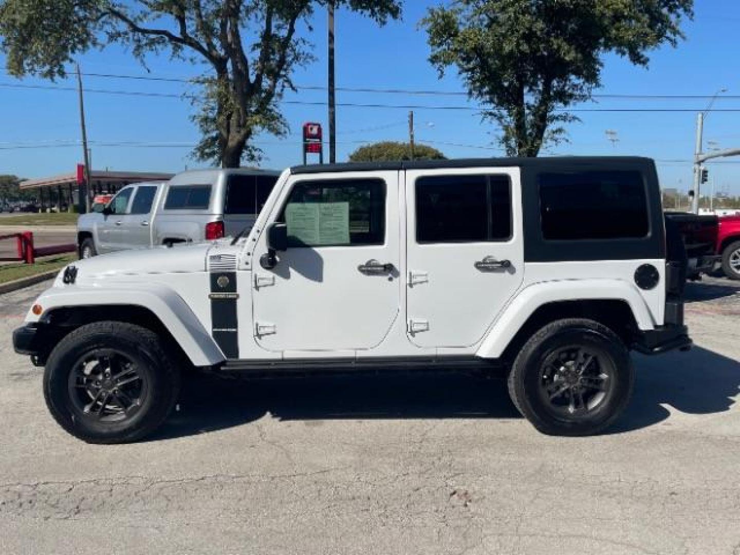 2018 Bright White Clear Coat /Black Leather Trim with Embossed inserts Jeep Wrangler JK Unlimited Sport 4WD (1C4BJWDG0JL) with an 3.6L V6 DOHC 24V FFV engine, 6-Speed Automatic transmission, located at 12182 Garland Rd, Dallas, TX, 75218, (214) 521-2040, 0.000000, 0.000000 - Photo#1