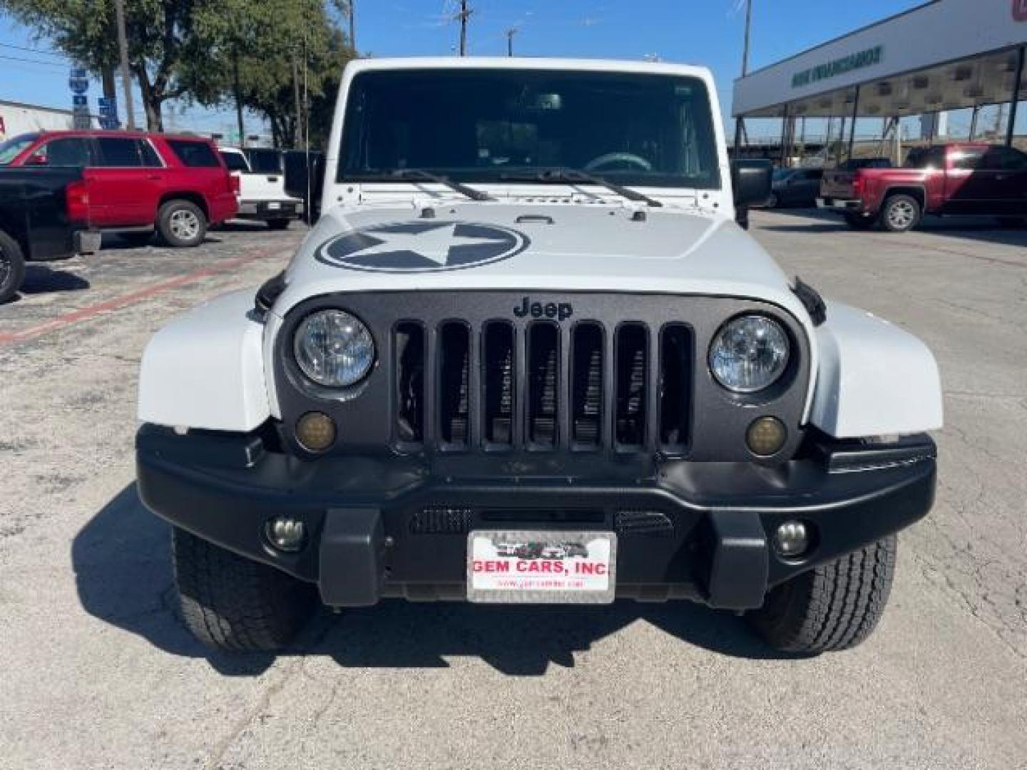 2018 Bright White Clear Coat /Black Leather Trim with Embossed inserts Jeep Wrangler JK Unlimited Sport 4WD (1C4BJWDG0JL) with an 3.6L V6 DOHC 24V FFV engine, 6-Speed Automatic transmission, located at 12182 Garland Rd, Dallas, TX, 75218, (214) 521-2040, 0.000000, 0.000000 - Photo#3