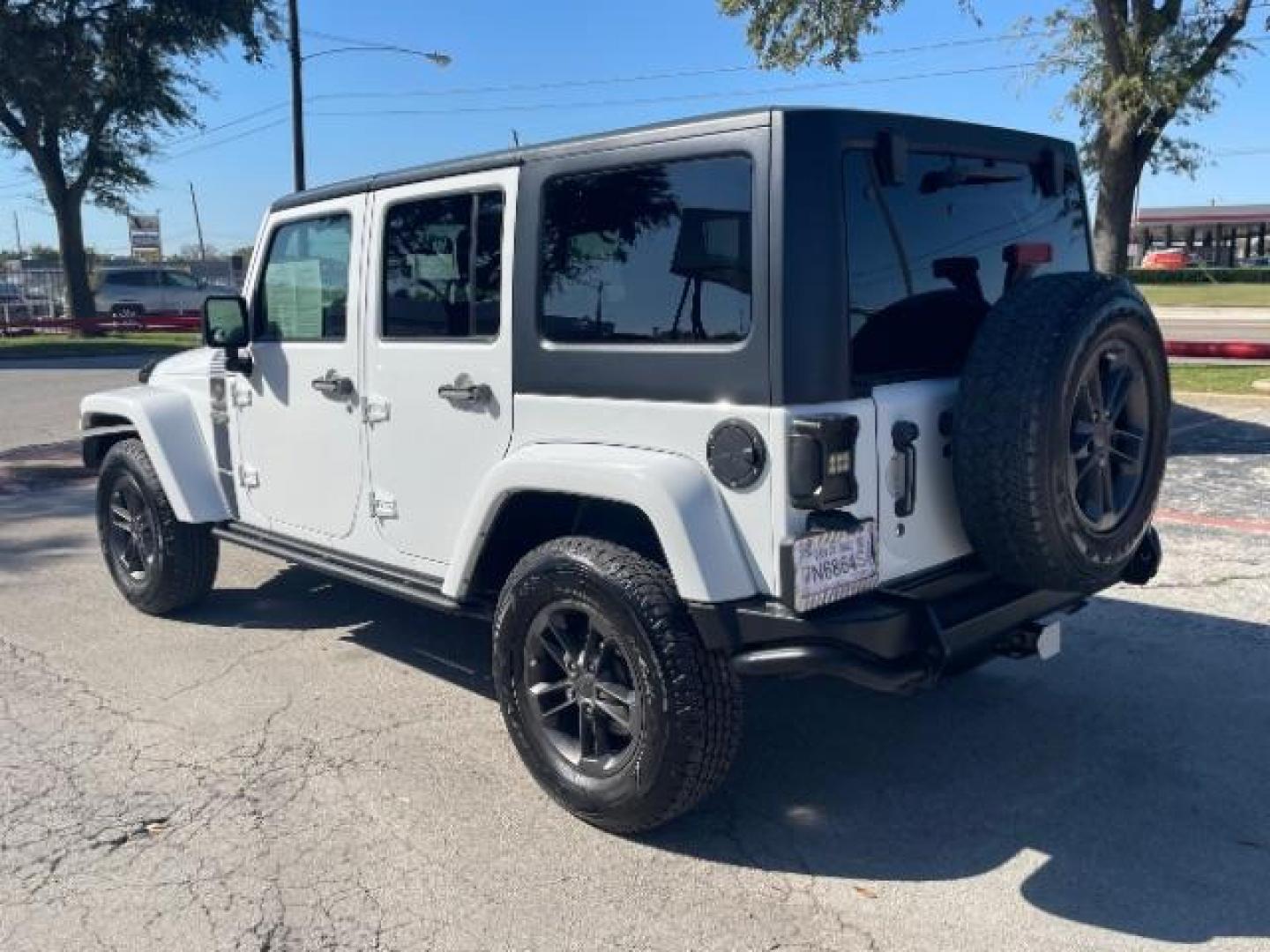 2018 Bright White Clear Coat /Black Leather Trim with Embossed inserts Jeep Wrangler JK Unlimited Sport 4WD (1C4BJWDG0JL) with an 3.6L V6 DOHC 24V FFV engine, 6-Speed Automatic transmission, located at 12182 Garland Rd, Dallas, TX, 75218, (214) 521-2040, 0.000000, 0.000000 - Photo#4