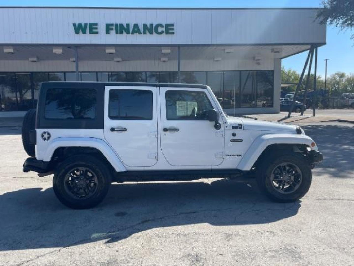 2018 Bright White Clear Coat /Black Leather Trim with Embossed inserts Jeep Wrangler JK Unlimited Sport 4WD (1C4BJWDG0JL) with an 3.6L V6 DOHC 24V FFV engine, 6-Speed Automatic transmission, located at 12182 Garland Rd, Dallas, TX, 75218, (214) 521-2040, 0.000000, 0.000000 - Photo#5