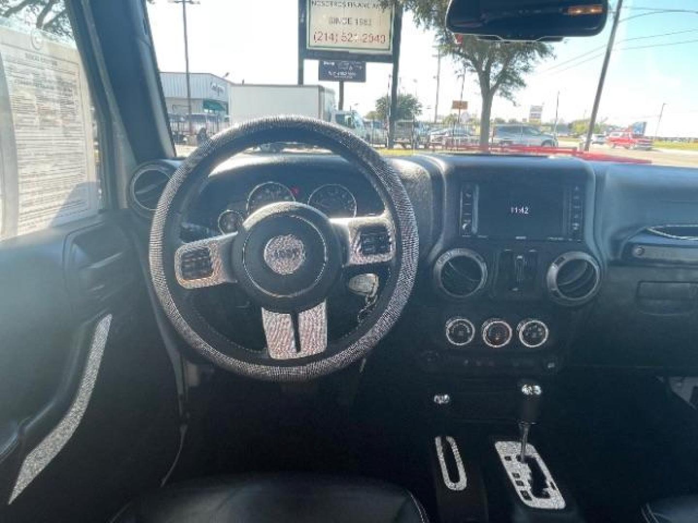 2018 Bright White Clear Coat /Black Leather Trim with Embossed inserts Jeep Wrangler JK Unlimited Sport 4WD (1C4BJWDG0JL) with an 3.6L V6 DOHC 24V FFV engine, 6-Speed Automatic transmission, located at 12182 Garland Rd, Dallas, TX, 75218, (214) 521-2040, 0.000000, 0.000000 - Photo#8