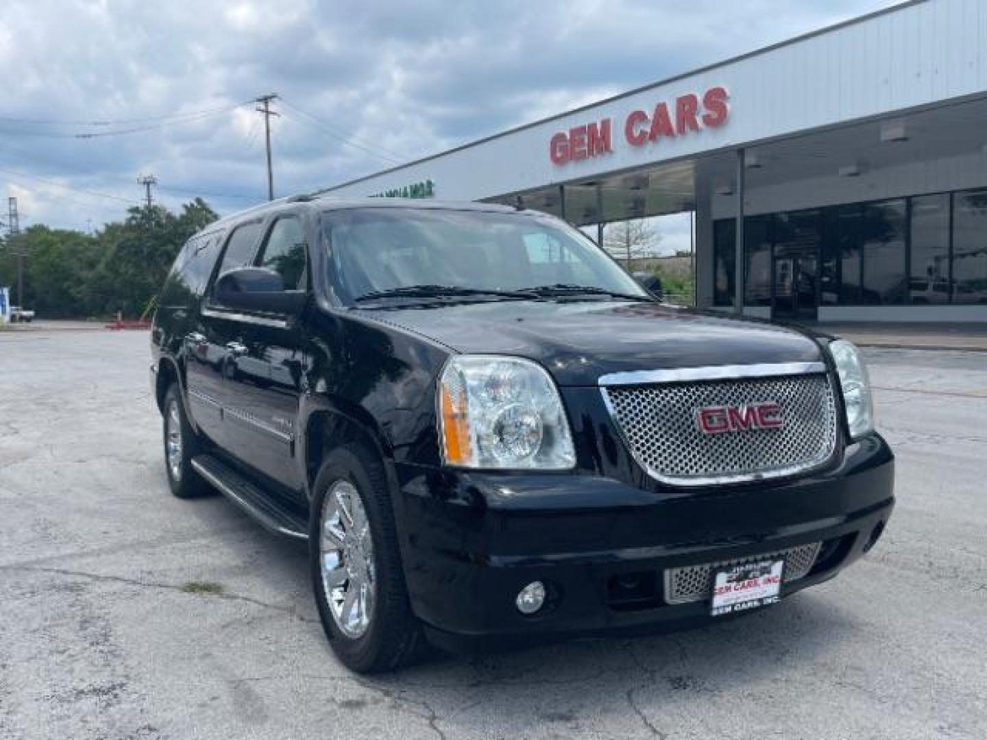 2013 Onyx Black GMC Yukon Denali XL 4WD (1GKS2MEF3DR) with an 6.2L V8 OHV 16V engine, 6-Speed Automatic transmission, located at 12182 Garland Rd, Dallas, TX, 75218, (214) 521-2040, 0.000000, 0.000000 - Photo#0