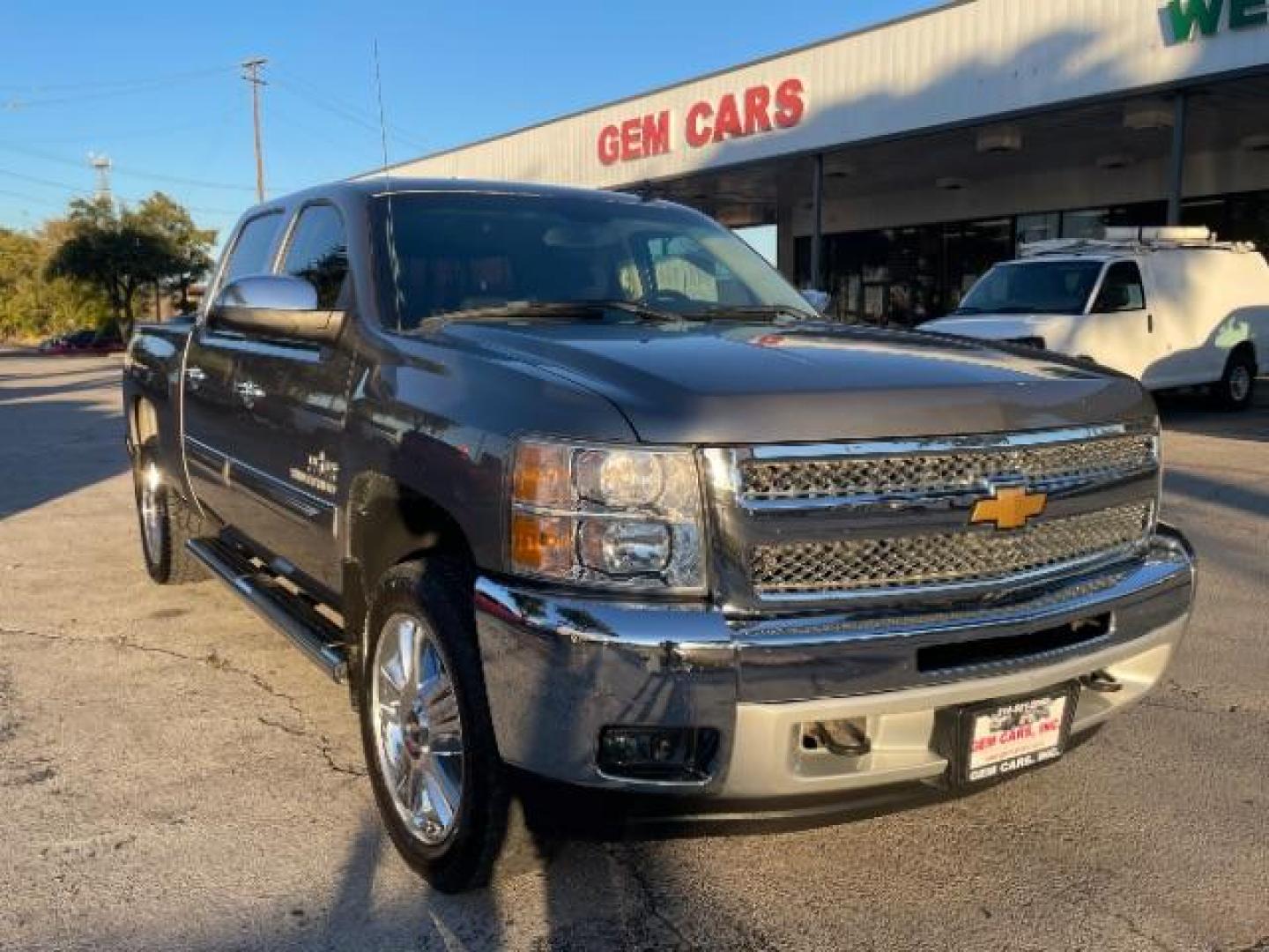 2013 Graystone Metallic Chevrolet Silverado 1500 LT Crew Cab 4WD (3GCPKSE76DG) with an 5.3L V8 OHV 16V FFV engine, located at 12182 Garland Rd, Dallas, TX, 75218, (214) 521-2040, 0.000000, 0.000000 - Photo#0