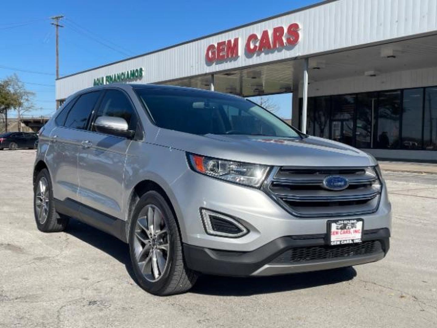 2016 Ingot Silver Metallic Ford Edge Titanium (2FMPK3K84GB) with an 3.5L V6 DOHC 24V engine, 6-Speed Automatic transmission, located at 12182 Garland Rd, Dallas, TX, 75218, (214) 521-2040, 0.000000, 0.000000 - Photo#0