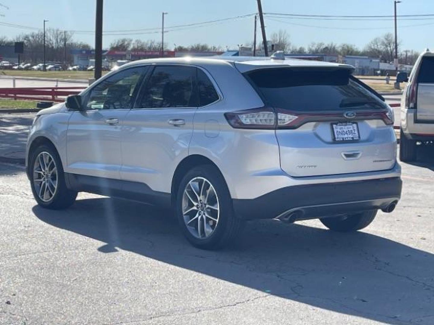 2016 Ingot Silver Metallic Ford Edge Titanium (2FMPK3K84GB) with an 3.5L V6 DOHC 24V engine, 6-Speed Automatic transmission, located at 12182 Garland Rd, Dallas, TX, 75218, (214) 521-2040, 0.000000, 0.000000 - Photo#2