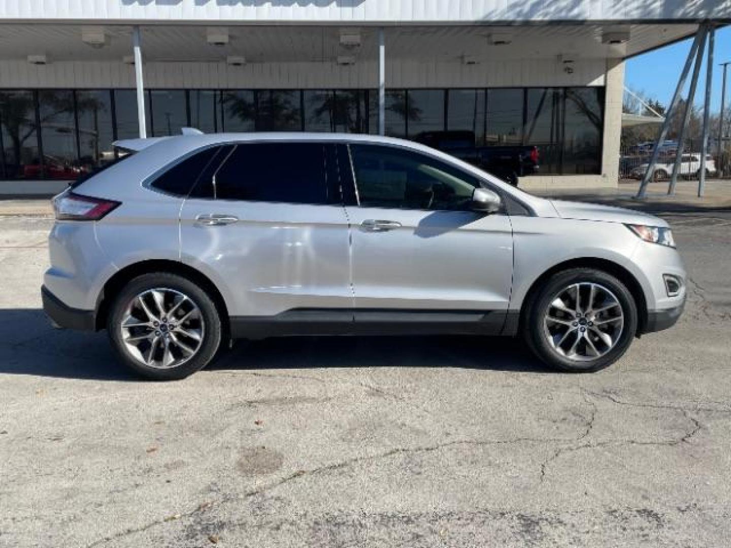 2016 Ingot Silver Metallic Ford Edge Titanium (2FMPK3K84GB) with an 3.5L V6 DOHC 24V engine, 6-Speed Automatic transmission, located at 12182 Garland Rd, Dallas, TX, 75218, (214) 521-2040, 0.000000, 0.000000 - Photo#6