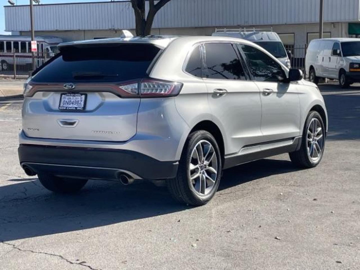 2016 Ingot Silver Metallic Ford Edge Titanium (2FMPK3K84GB) with an 3.5L V6 DOHC 24V engine, 6-Speed Automatic transmission, located at 12182 Garland Rd, Dallas, TX, 75218, (214) 521-2040, 0.000000, 0.000000 - Photo#7