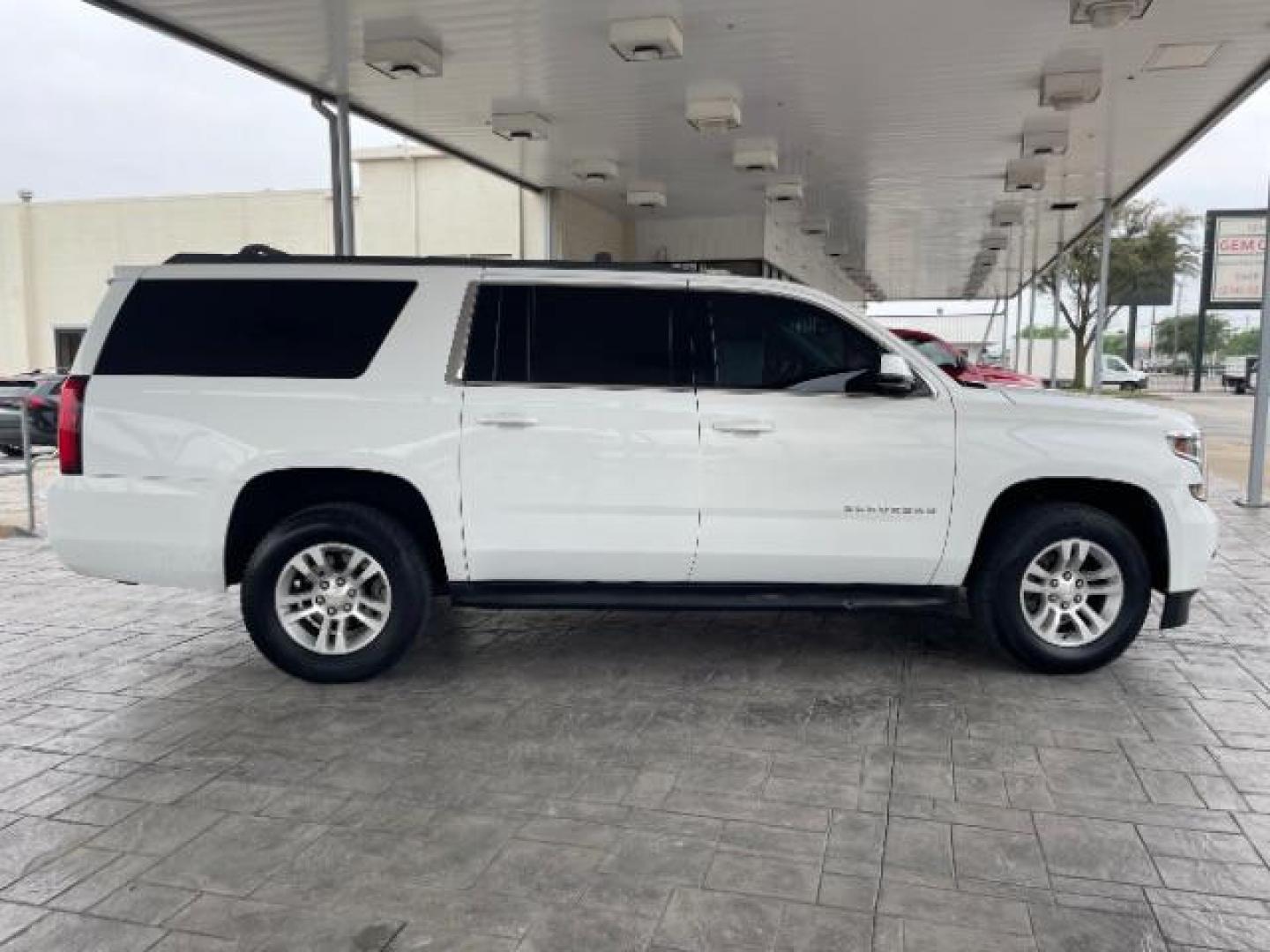 2018 Summit White Chevrolet Suburban LS 2WD (1GNSCGKC6JR) with an 5.3L V8 OHV 16V engine, 6-Speed Automatic transmission, located at 12182 Garland Rd, Dallas, TX, 75218, (214) 521-2040, 0.000000, 0.000000 - Photo#9