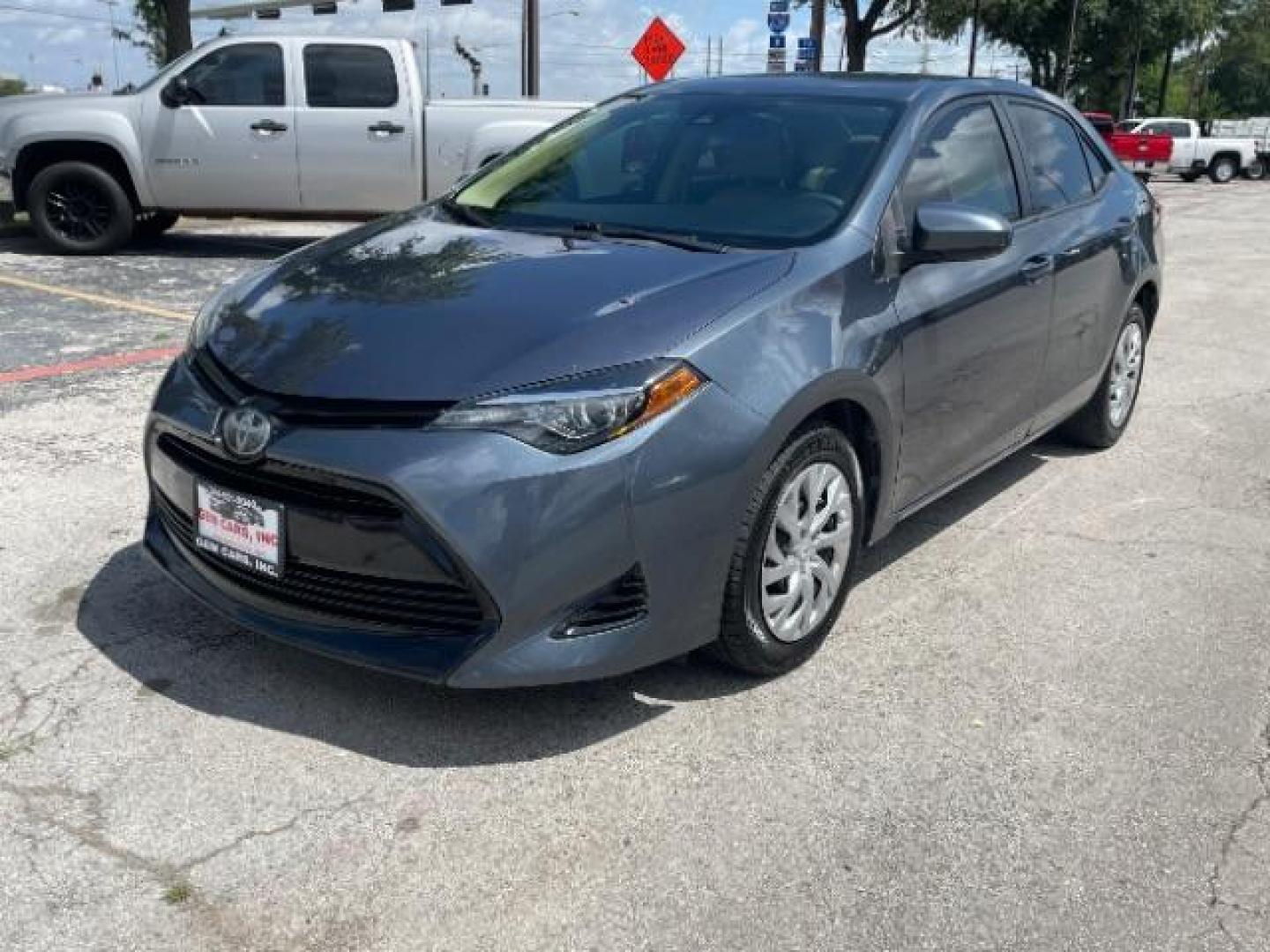 2018 Falcon Gray Metallic Toyota Corolla LE CVT (5YFBURHE7JP) with an 1.8L L4 DOHC 16V engine, Continuously Variable Transmission transmission, located at 12182 Garland Rd, Dallas, TX, 75218, (214) 521-2040, 0.000000, 0.000000 - Photo#4