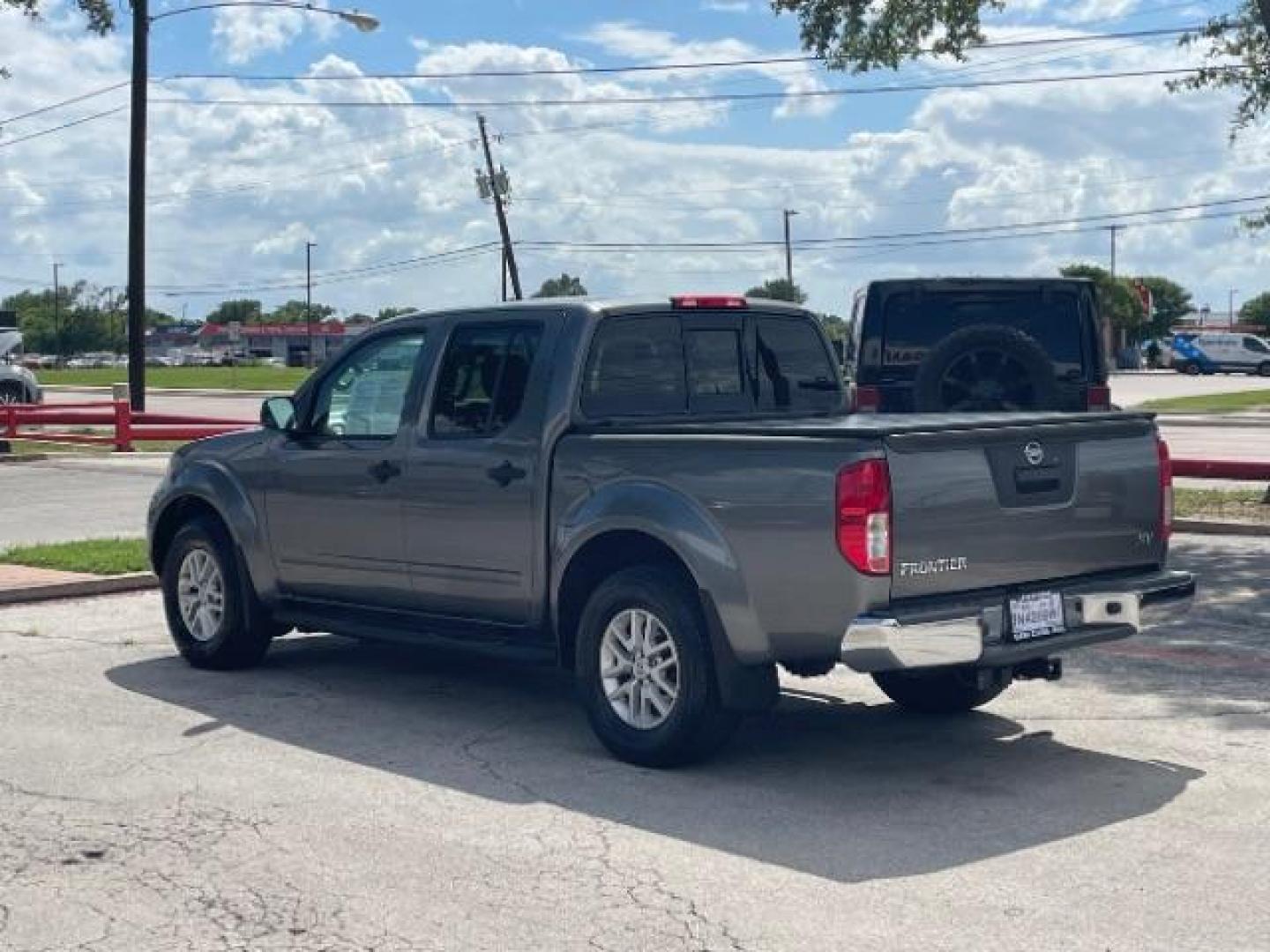 2016 Gray Nissan Frontier SV (1N6AD0ER2GN) , located at 12182 Garland Rd, Dallas, TX, 75218, (214) 521-2040, 0.000000, 0.000000 - Photo#2