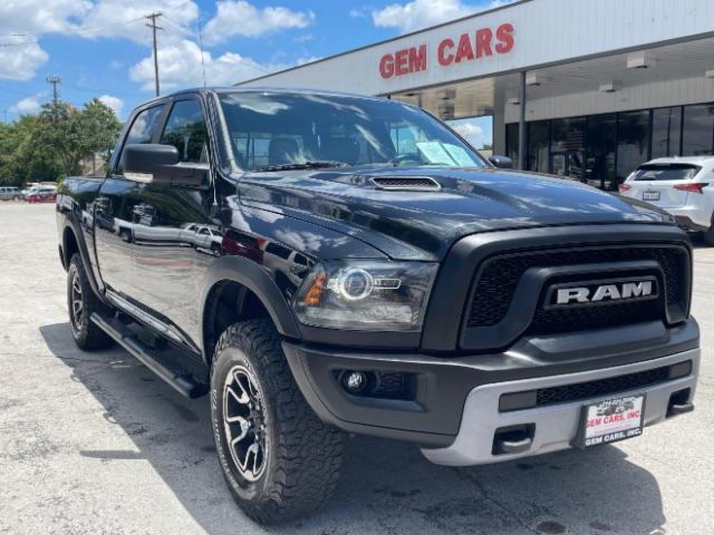 2016 Brilliant Black Crystal Pearl Coat RAM 1500 Rebel Crew Cab SWB 4WD (1C6RR7YT5GS) with an 5.7L V8 OHV 16V engine, 8-Speed Automatic transmission, located at 12182 Garland Rd, Dallas, TX, 75218, (214) 521-2040, 0.000000, 0.000000 - Photo#0