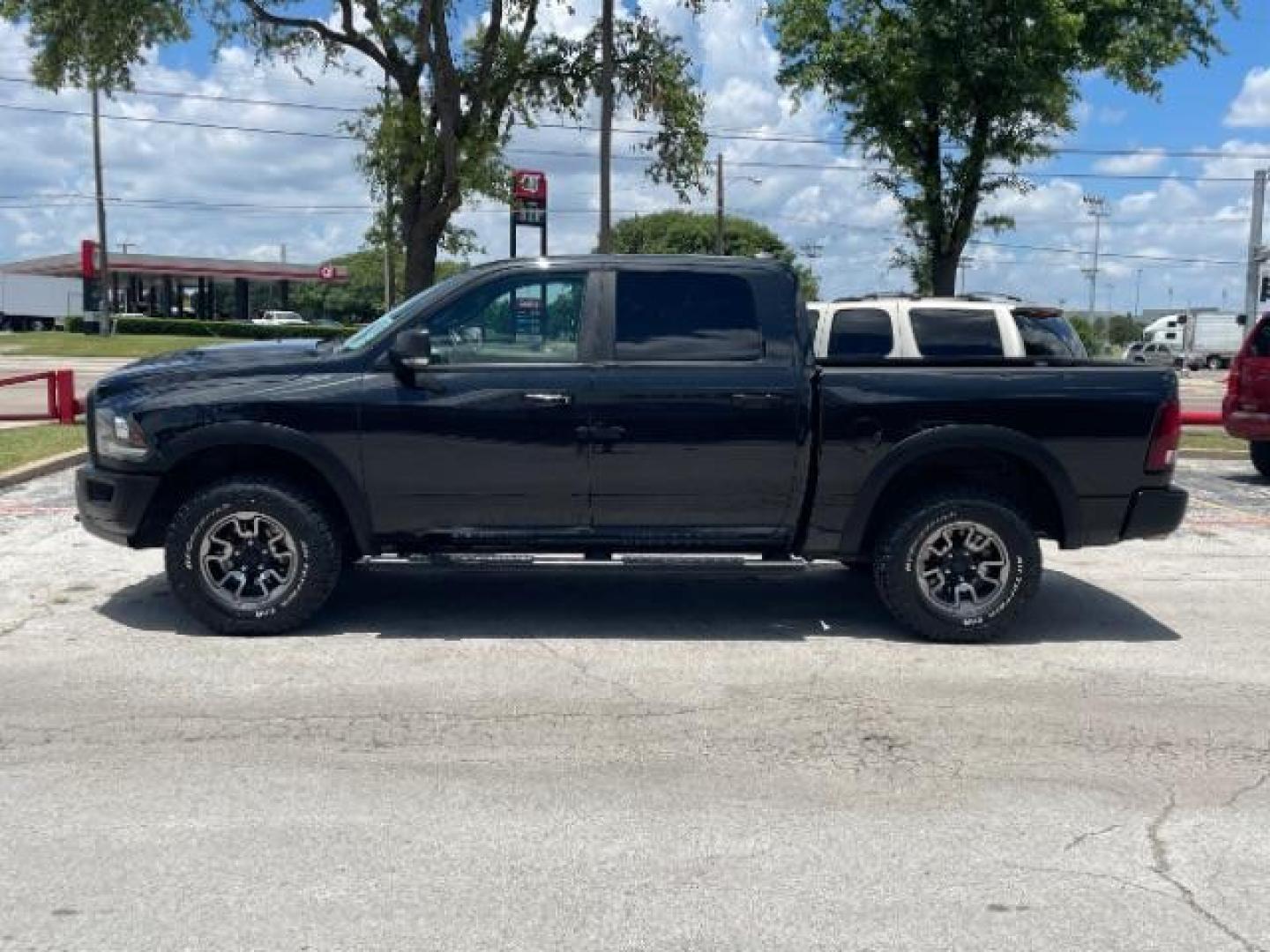 2016 Brilliant Black Crystal Pearl Coat RAM 1500 Rebel Crew Cab SWB 4WD (1C6RR7YT5GS) with an 5.7L V8 OHV 16V engine, 8-Speed Automatic transmission, located at 12182 Garland Rd, Dallas, TX, 75218, (214) 521-2040, 0.000000, 0.000000 - Photo#6