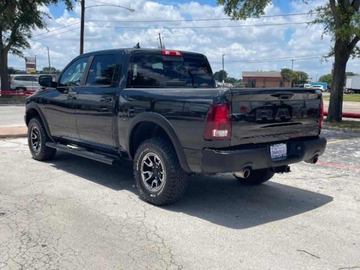 2016 Brilliant Black Crystal Pearl Coat RAM 1500 Rebel Crew Cab SWB 4WD (1C6RR7YT5GS) with an 5.7L V8 OHV 16V engine, 8-Speed Automatic transmission, located at 12182 Garland Rd, Dallas, TX, 75218, (214) 521-2040, 0.000000, 0.000000 - Photo#5