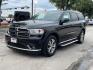 2015 Brilliant Black Crystal Pearl Coat Dodge Durango Limited AWD (1C4RDJDG1FC) with an 3.6L V6 DOHC 24V engine, 8-Speed Automatic transmission, located at 12182 Garland Rd, Dallas, TX, 75218, (214) 521-2040, 0.000000, 0.000000 - Photo#1