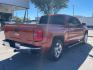 2015 Orange Chevrolet Silverado 1500 LTZ Crew Cab 2WD (3GCPCSEC9FG) with an 5.3L V8 OHV 16V engine, 6-Speed Automatic transmission, located at 12182 Garland Rd, Dallas, TX, 75218, (214) 521-2040, 0.000000, 0.000000 - Photo#4