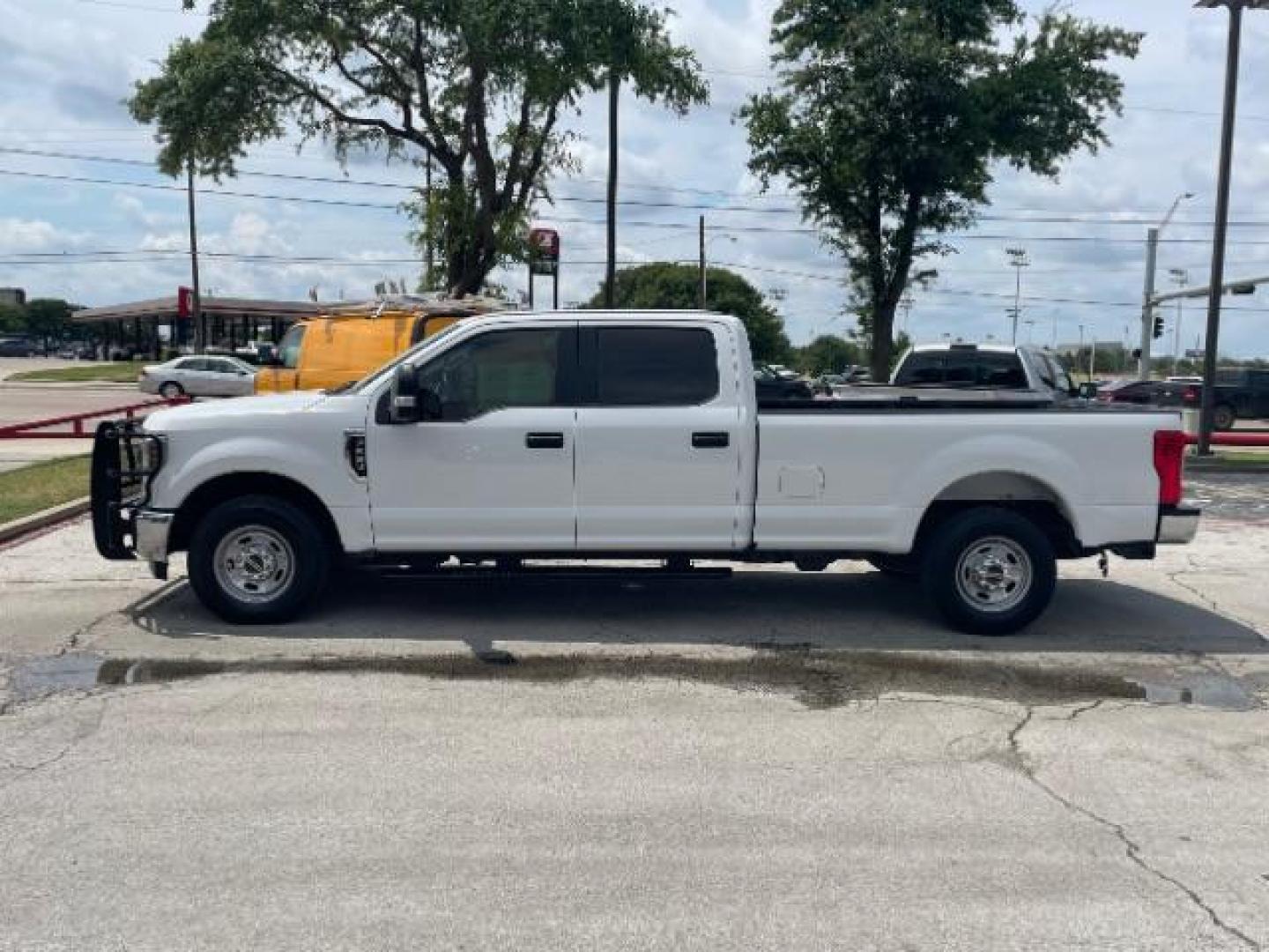 2019 Oxford White Ford F-250 SD XL Crew Cab Long Bed 2WD (1FT7W2A61KE) with an 6.2L V8 OHV 16V engine, 6-Speed Automatic transmission, located at 12182 Garland Rd, Dallas, TX, 75218, (214) 521-2040, 0.000000, 0.000000 - Photo#5