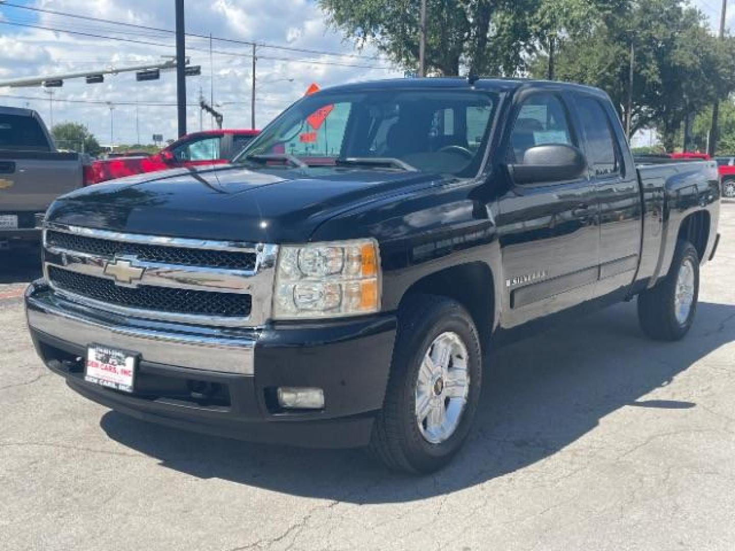 2007 Black Chevrolet Silverado 1500 LT1 Ext. Cab Short Box 2WD (2GCEC190371) with an 5.3L V8 OHV 16V FFV engine, 4-Speed Automatic transmission, located at 12182 Garland Rd, Dallas, TX, 75218, (214) 521-2040, 0.000000, 0.000000 - Photo#2