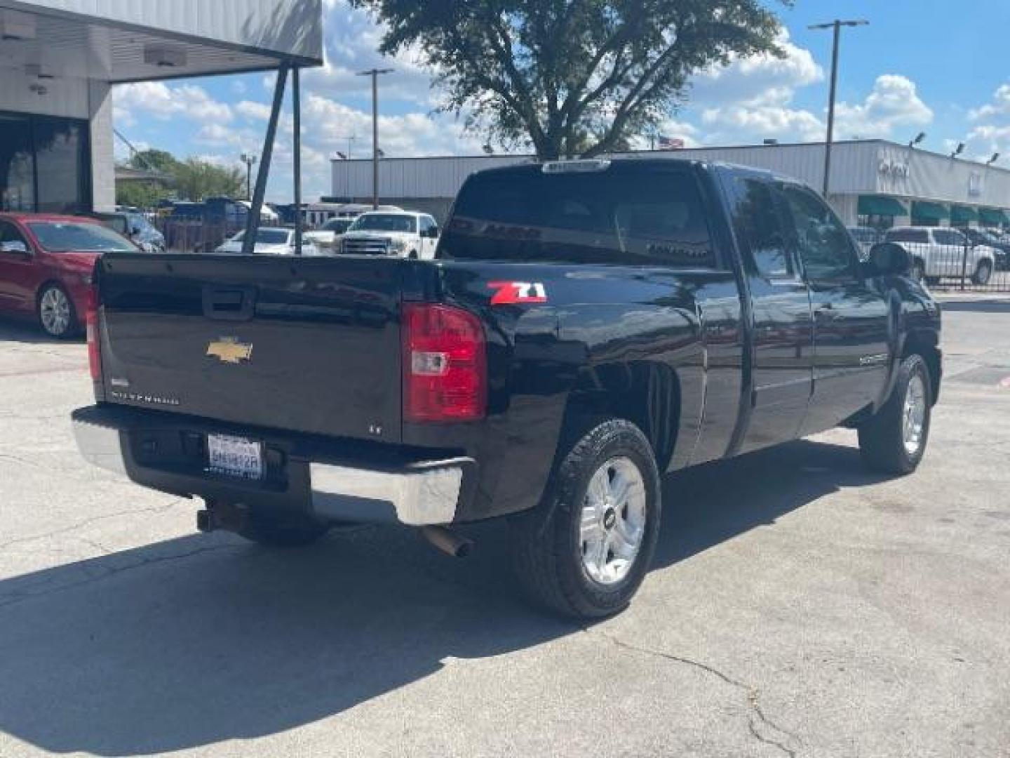 2007 Black Chevrolet Silverado 1500 LT1 Ext. Cab Short Box 2WD (2GCEC190371) with an 5.3L V8 OHV 16V FFV engine, 4-Speed Automatic transmission, located at 12182 Garland Rd, Dallas, TX, 75218, (214) 521-2040, 0.000000, 0.000000 - Photo#4