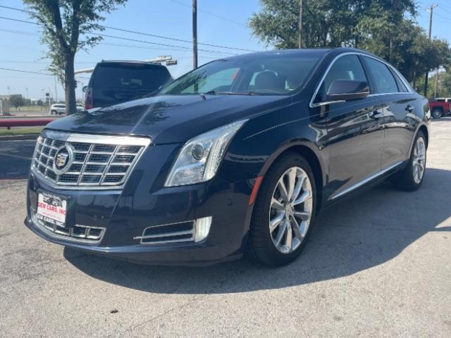 2014 Sapphire Blue Metall /Jet Black Cadillac XTS Luxury FWD (2G61M5S37E9) with an 3.6L V6 DOHC 24V engine, 6-Speed Automatic transmission, located at 12182 Garland Rd, Dallas, TX, 75218, (214) 521-2040, 0.000000, 0.000000 - Photo#4