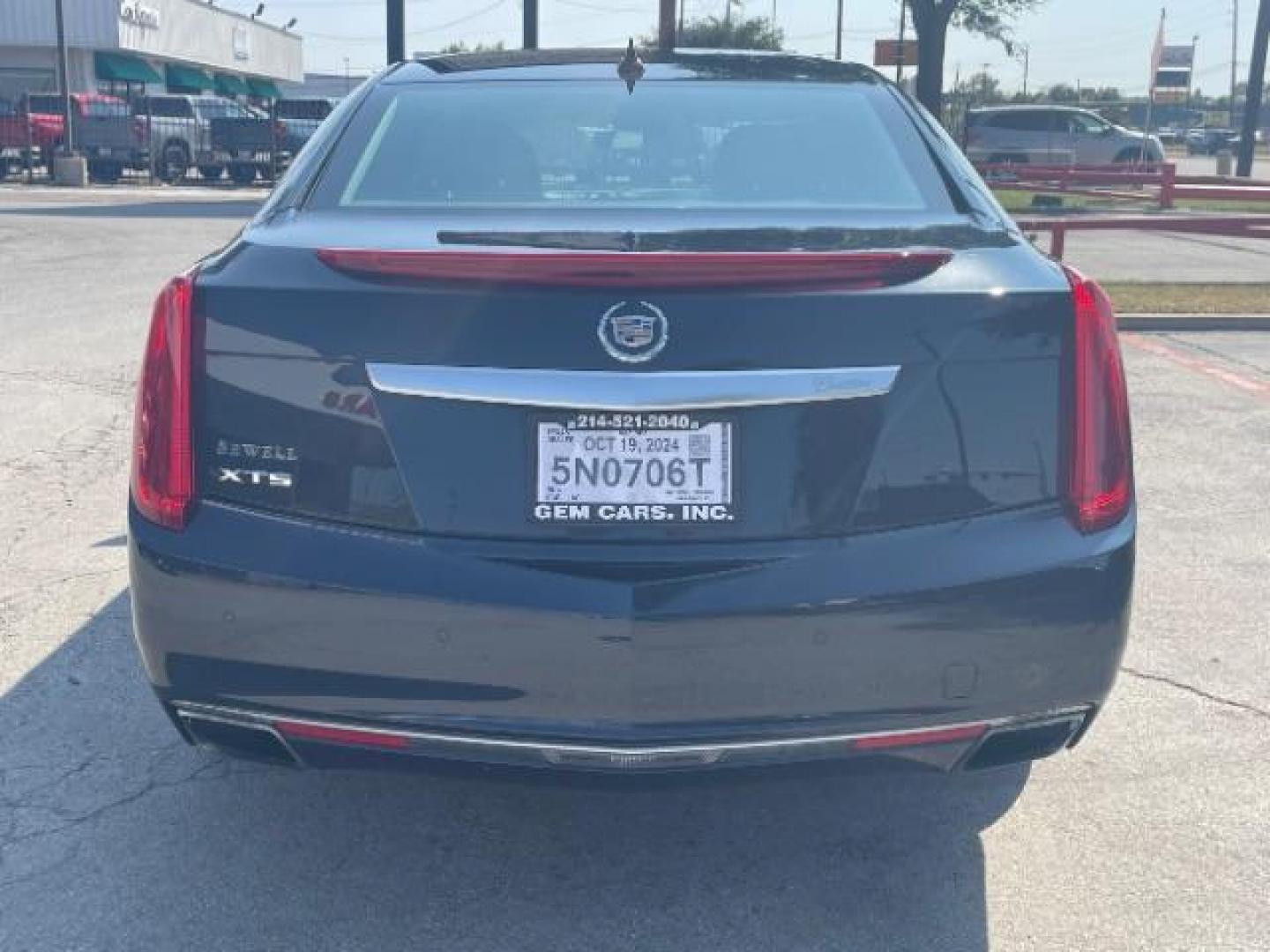 2014 Sapphire Blue Metall /Jet Black Cadillac XTS Luxury FWD (2G61M5S37E9) with an 3.6L V6 DOHC 24V engine, 6-Speed Automatic transmission, located at 12182 Garland Rd, Dallas, TX, 75218, (214) 521-2040, 0.000000, 0.000000 - Photo#5