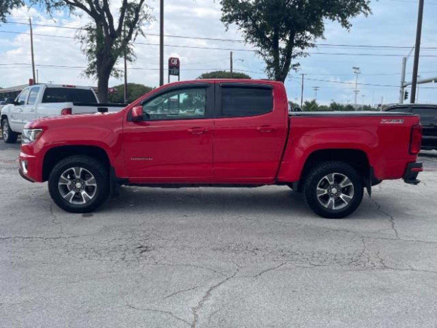 2015 Red Rock Metallic Chevrolet Colorado Z71 Crew Cab 4WD Short Box (1GCGTCE34F1) with an 3.6L V6 DOHC 24V GAS engine, 6-Speed Automatic transmission, located at 12182 Garland Rd, Dallas, TX, 75218, (214) 521-2040, 0.000000, 0.000000 - Photo#1