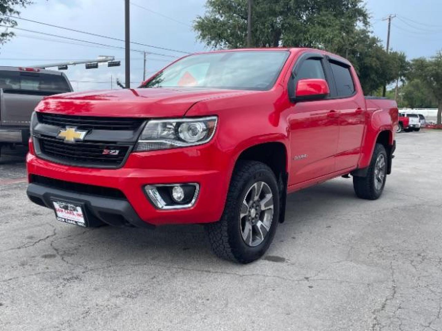 2015 Red Rock Metallic Chevrolet Colorado Z71 Crew Cab 4WD Short Box (1GCGTCE34F1) with an 3.6L V6 DOHC 24V GAS engine, 6-Speed Automatic transmission, located at 12182 Garland Rd, Dallas, TX, 75218, (214) 521-2040, 0.000000, 0.000000 - Photo#2