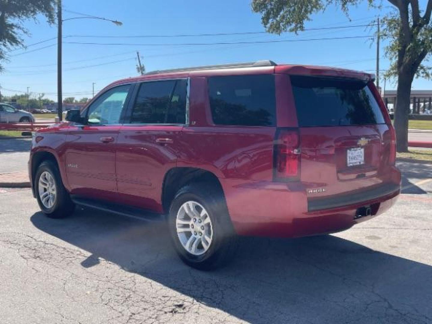 2015 RED Chevrolet Tahoe LT 2WD (1GNSCBKC3FR) with an 5.3L V8 OHV 16V engine, 6-Speed Automatic transmission, located at 12182 Garland Rd, Dallas, TX, 75218, (214) 521-2040, 0.000000, 0.000000 - Photo#2