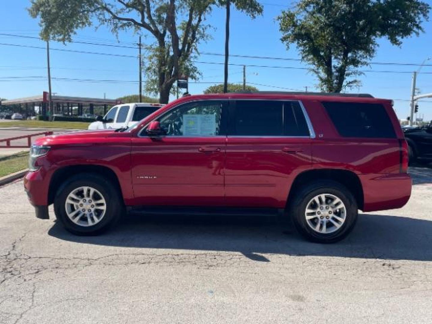 2015 RED Chevrolet Tahoe LT 2WD (1GNSCBKC3FR) with an 5.3L V8 OHV 16V engine, 6-Speed Automatic transmission, located at 12182 Garland Rd, Dallas, TX, 75218, (214) 521-2040, 0.000000, 0.000000 - Photo#3