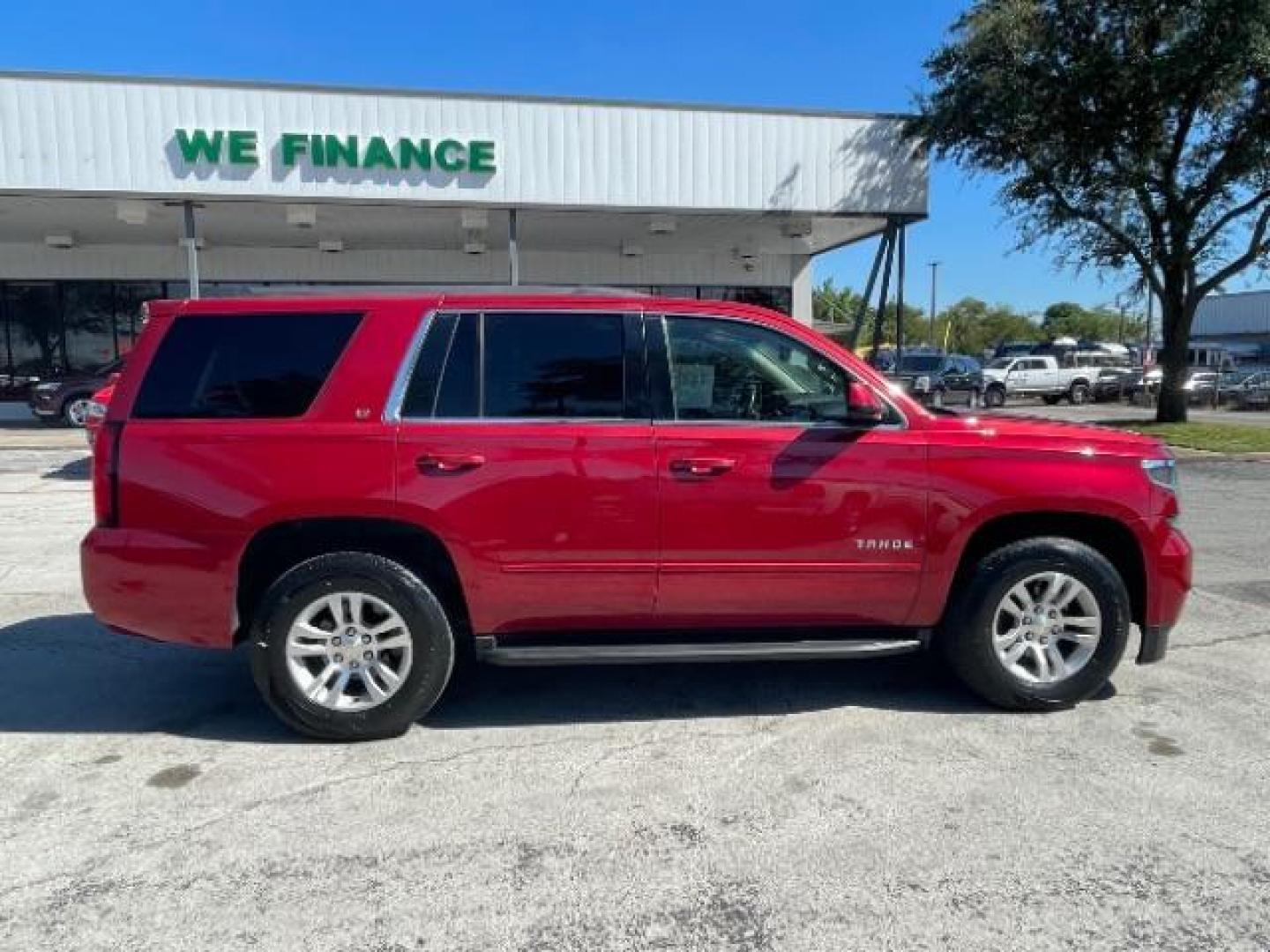 2015 RED Chevrolet Tahoe LT 2WD (1GNSCBKC3FR) with an 5.3L V8 OHV 16V engine, 6-Speed Automatic transmission, located at 12182 Garland Rd, Dallas, TX, 75218, (214) 521-2040, 0.000000, 0.000000 - Photo#5