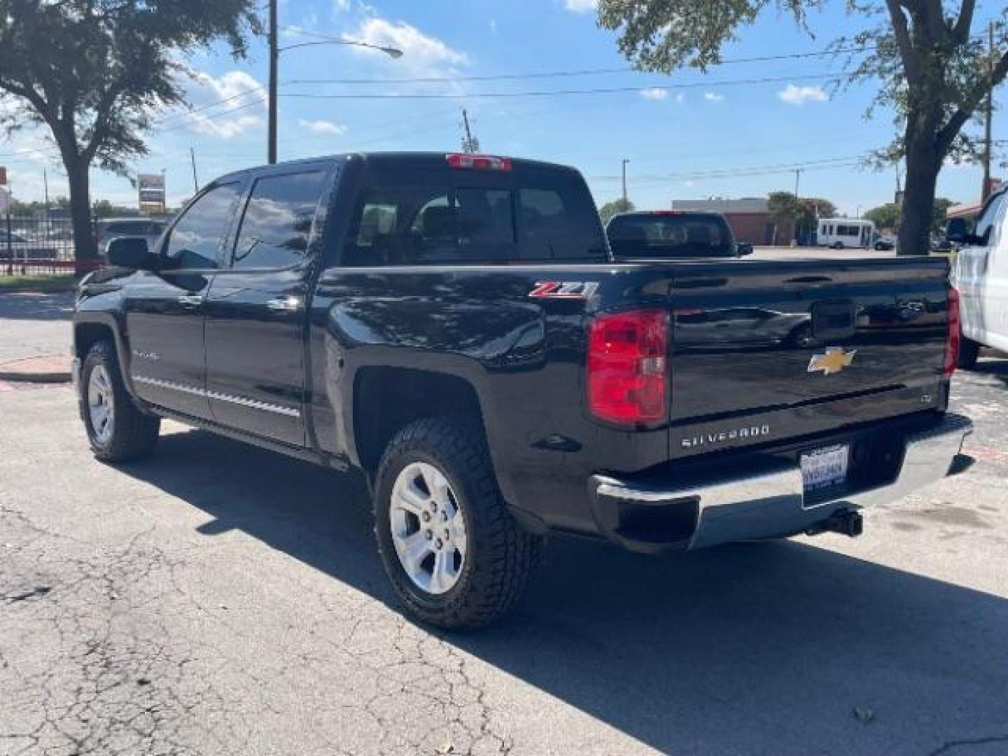 2014 Black Chevrolet Silverado 1500 LTZ (3GCPCSEC8EG) , located at 12182 Garland Rd, Dallas, TX, 75218, (214) 521-2040, 0.000000, 0.000000 - Photo#4